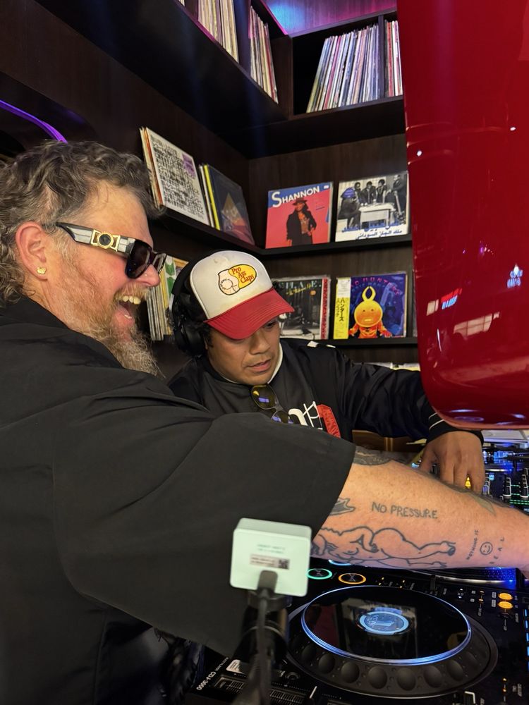 DJ spinning soul and funk records in the Stereo 41 lounge