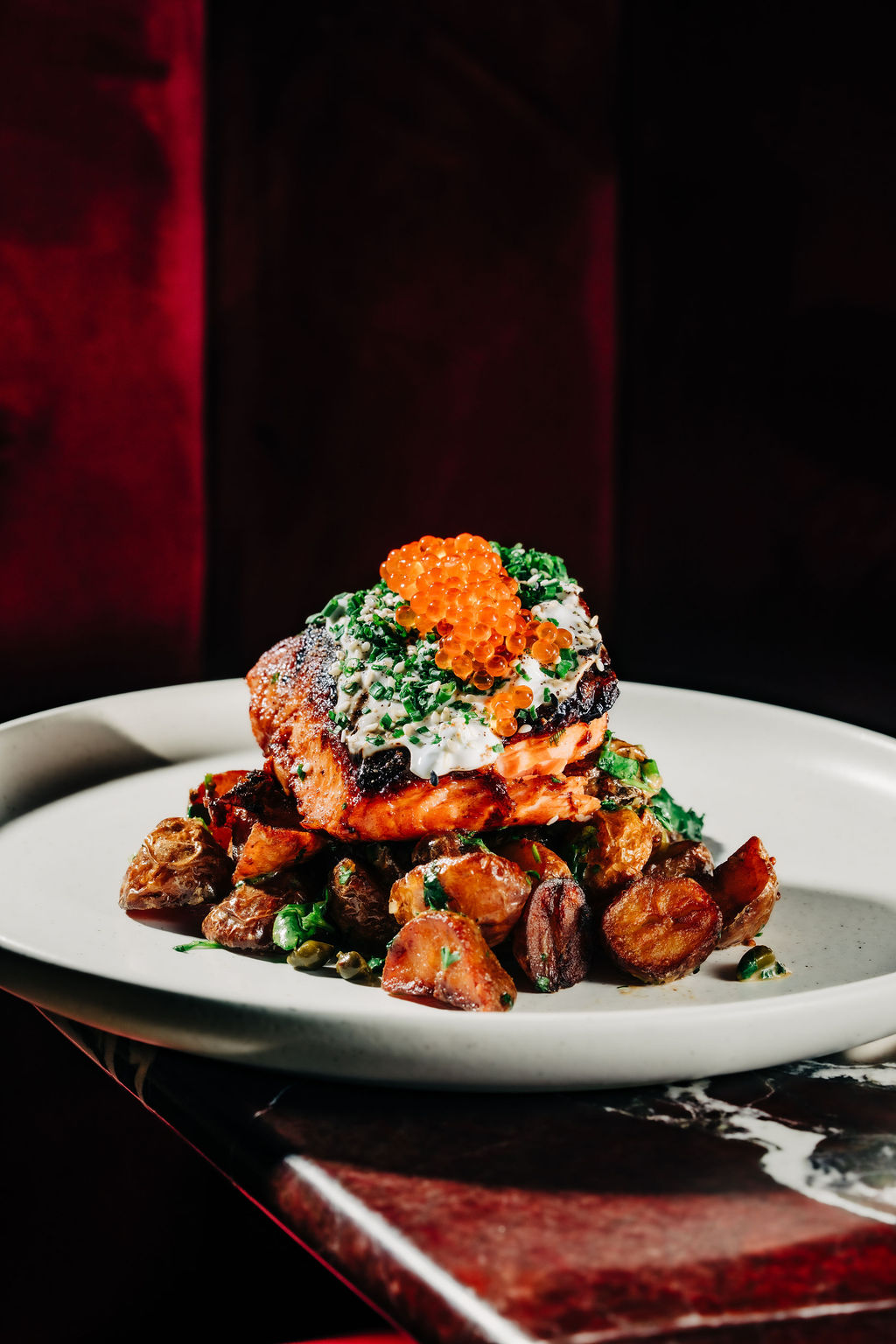 Salmon with chermoula, pickled onion, and fresh herbs at Stereo 41 in Walnut Creek