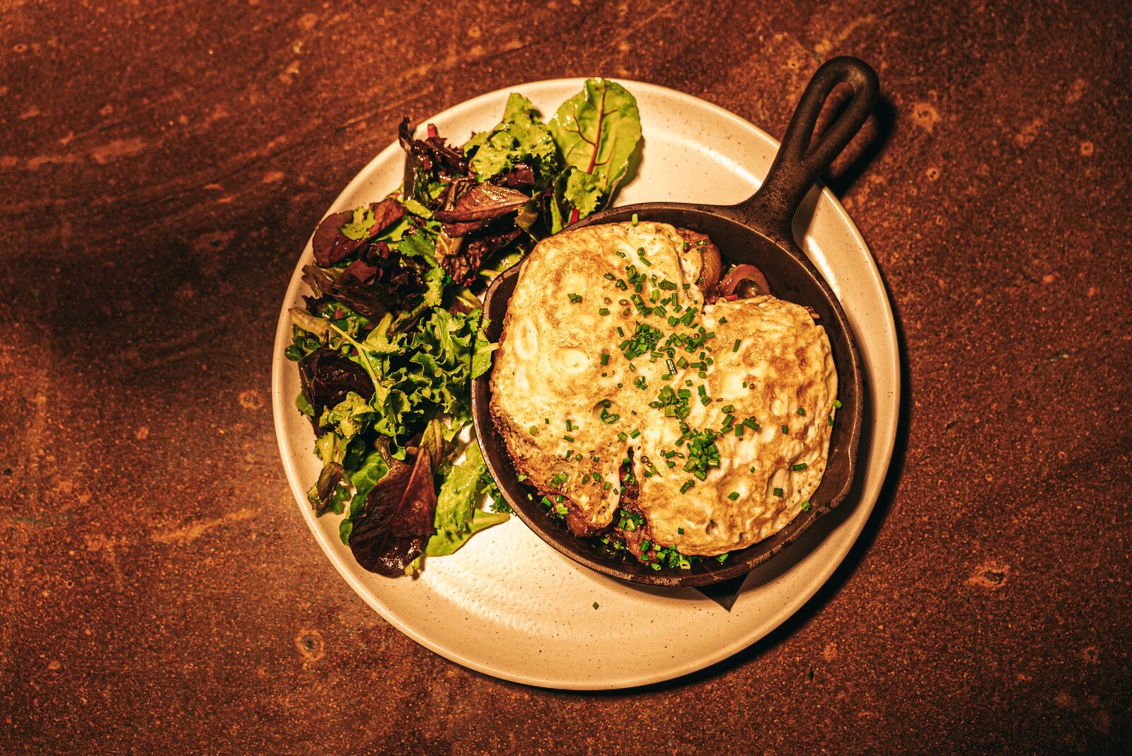 Short Rib Skillet with fried eggs and greens - Southern brunch Walnut Creek
