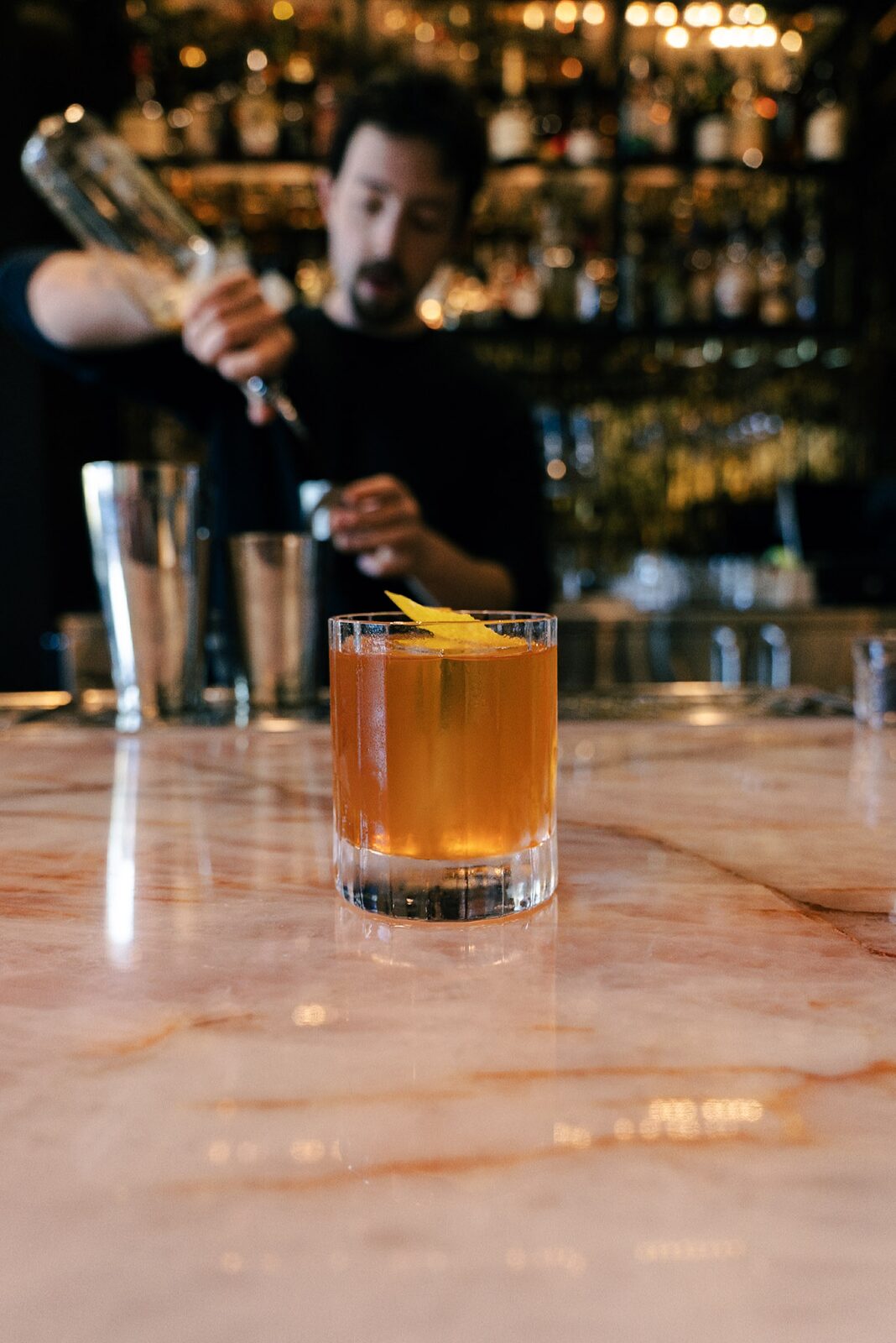 A cocktail on the marble bar