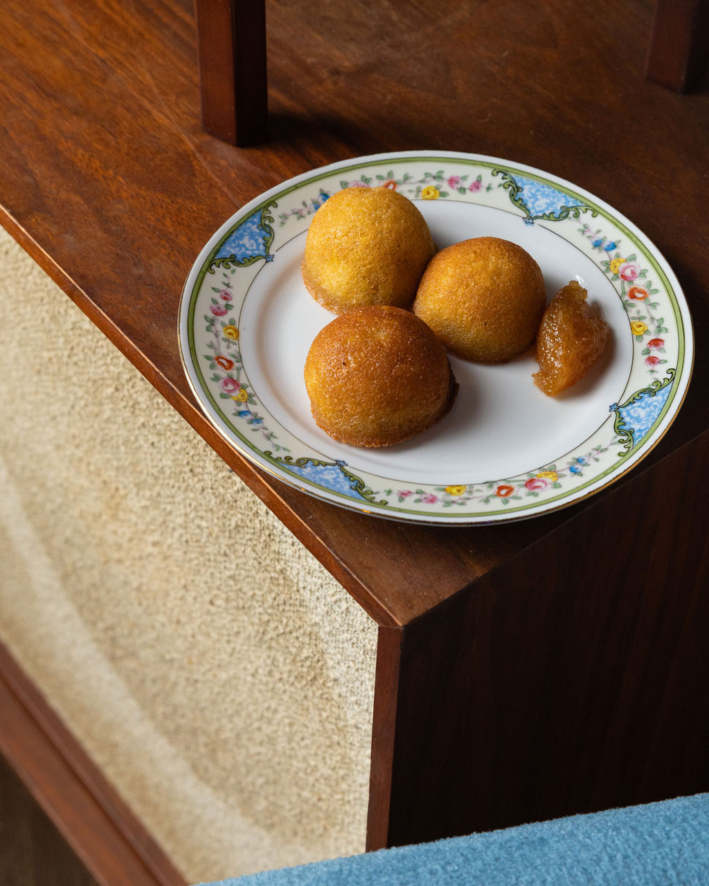 Golden fried cornbread bites on vintage china at Stereo 41